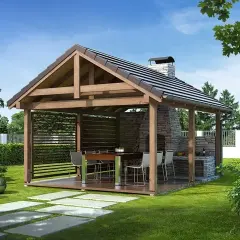 Nowoczesna altana przy domu z kamiennym grillem i miejscem do siedzenia. Idealne miejsce na letnie spotkania.